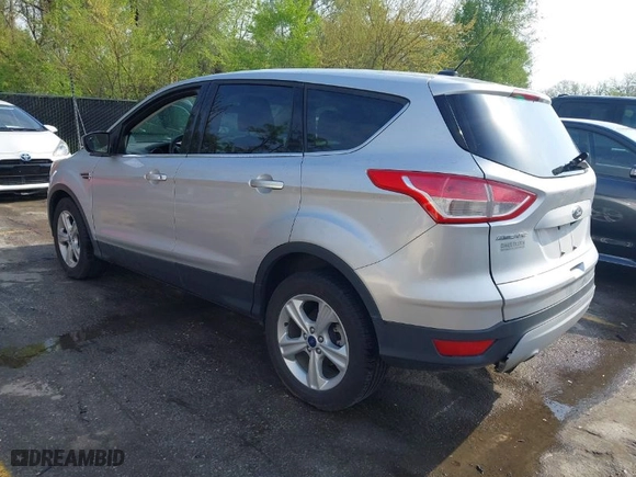 2015 Ford Escape SE with VIN 1FMCU9GX5FUC62439, listed as a IAAI auction lot 42066128 with 137,845 mi miles. Bid and sale history available at carsss.com. Image 3.