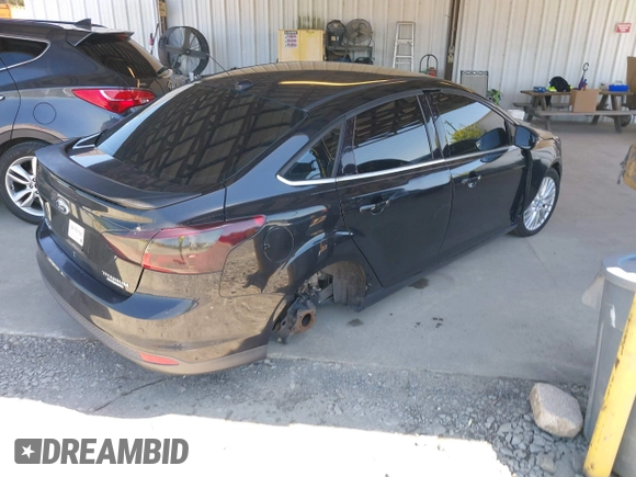 2013 Ford Focus Titanium with VIN 1FADP3J20DL143491, listed as a IAAI auction lot 42034388 with 194,388 mi miles and . Bid and sale history available at carsss.com. Image 4.