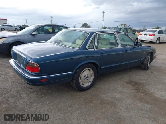 1996 Jaguar XJ with VIN SAJHX1743TC759842, listed as a IAAI auction lot 41778155 with 189,315 mi miles and . Bid and sale history available at DreamBid. Image 4.