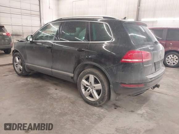 2012 Volkswagen Touareg Sport with VIN WVGEF9BP8CD009511, listed as a IAAI auction lot 41457989 with 87,325 mi miles and . Bid and sale history available at DreamBid. Image 3.