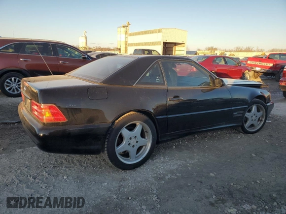 1999 Mercedes-Benz SL-Class with VIN WDBFA68F9XF178143, listed as a Copart auction lot 83255114 with 129,970 mi miles and Salvage Title. Bid and sale history available at carsss.com. Image 3.