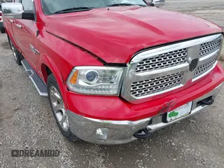 2015 Ram 1500 Laramie z VIN 1C6RR7JM8FS501701, wystawiony jako IAAI lot #42224424 z przebiegiem 59 591 mil mil oraz . Historia ofert i sprzedaży dostępna na DreamBid. Obrazek 6.