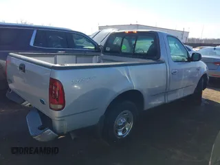 2002 Ford F-150 XL with VIN 1FTRF17222NC00760, listed as a IAAI auction lot 41653940 with 314,637 mi miles. Bid and sale history available at carsss.com. Image 4.