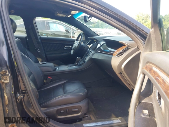 2014 Ford Taurus Limited with VIN 1FAHP2F86EG163392, listed as a IAAI auction lot 42538336 with 131,910 mi miles and . Bid and sale history available at DreamBid. Image 5.