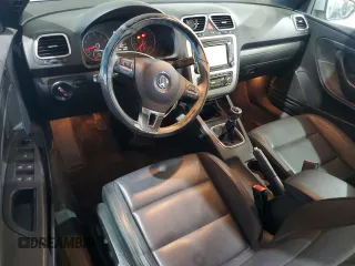 2011 Volkswagen Eos with VIN WVWAA7AH8BV000557, listed as a Copart auction lot 76523654 with 143,159 mi miles and Clean Title. Bid and sale history available at DreamBid. Image 8.