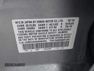 2009 Honda Fit Sport with VIN JHMGE88469S063030, listed as a IAAI auction lot 42064670 with 156,791 mi miles. Bid and sale history available at carsss.com. Image 9.