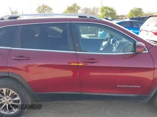 2019 Jeep Cherokee Altitude with VIN 1C4PJLLXXKD120325, listed as a IAAI auction lot 41838643 with 124,315 mi miles and . Bid and sale history available at DreamBid. Image 14.