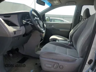 2015 Toyota Sienna LE AAS with VIN 5TDKK3DC9FS609084, listed as a Copart auction lot 57055295 with 247,531 mi miles and Salvage title. Bid and sale history available at DreamBid. Image 7.
