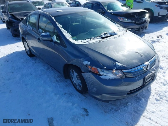 2012 Honda Civic Hybrid with VIN JHMFB4F35CS003299, listed as a IAAI auction lot 41509713 with 144,024 mi miles. Bid and sale history available at carsss.com. Image 1.
