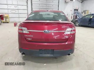 2015 Ford Taurus SEL z VIN 1FAHP2H88FG163179, wystawiony jako IAAI lot #42345579 z przebiegiem 142 424 mil mil oraz . Historia ofert i sprzedaży dostępna na DreamBid. Obrazek 16.