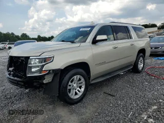 2015 Chevrolet Suburban LT with VIN 1GNSCJKC3FR652426, listed as a Copart auction lot 60554405 with 200,570 mi miles and Salvage title. Bid and sale history available at DreamBid. Image 1.