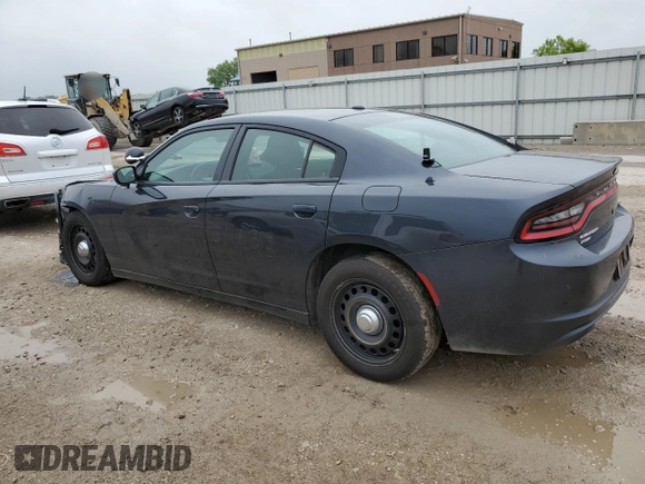 2019 Dodge Charger Police with VIN 2C3CDXKT1KH582405, listed as a Copart auction lot 57046445 with 136,171 mi miles and Salvage title. Bid and sale history available at DreamBid. Image 2.