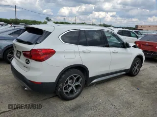 2019 BMW X1 xDrive28i with VIN WBXHT3C59K5L90317, listed as a Copart auction lot 61028125 with 46,789 mi miles and Salvage title. Bid and sale history available at DreamBid. Image 3.
