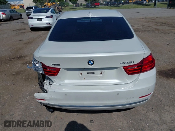 2015 BMW 4 Series 428i xDrive with VIN WBA3N5C52FK484864, listed as a IAAI auction lot 42569077 with 95,431 mi miles and . Bid and sale history available at DreamBid. Image 16.