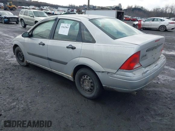 2001 Ford Focus LX with VIN 1FAFP33P31W297608, listed as a IAAI auction lot 41663965 with 142,898 mi miles and . Bid and sale history available at carsss.com. Image 3.