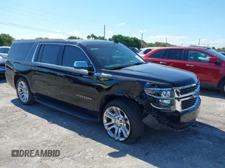 2019 Chevrolet Suburban LT with VIN 1GNSCHKC0KR155143, listed as a IAAI auction lot 42027550 with 69,028 mi miles and . Bid and sale history available at DreamBid. Image 1.