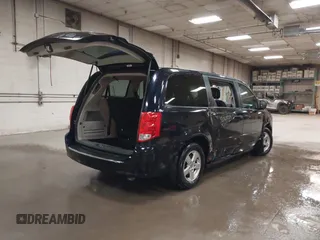 2011 Dodge Grand Caravan Mainstreet z VIN 2D4RN3DG2BR627795, wystawiony jako IAAI lot #42060059 z przebiegiem 91 442 mil mil oraz . Historia ofert i sprzedaży dostępna na DreamBid. Obrazek 4.