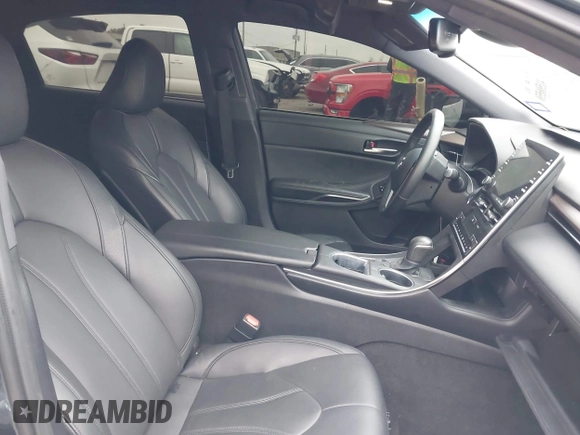 2022 Toyota Avalon XLE z VIN 4T1JZ1FB2NU073049, wystawiony jako IAAI lot #41506550 z przebiegiem 52 073 mil mil oraz . Historia ofert i sprzedaży dostępna na DreamBid. Obrazek 5.