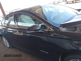 2014 Ford Fusion SE Hybrid with VIN 3FA6P0LUXER291754, listed as a IAAI auction lot 42415936 with 154,474 mi miles and . Bid and sale history available at DreamBid. Image 13.