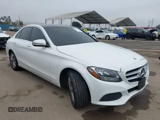 2018 Mercedes-Benz C with VIN 55SWF4JB5JU253705, listed as a IAAI auction lot 42158469 with 93,676 mi miles. Bid and sale history available at carsss.com. Image 1.