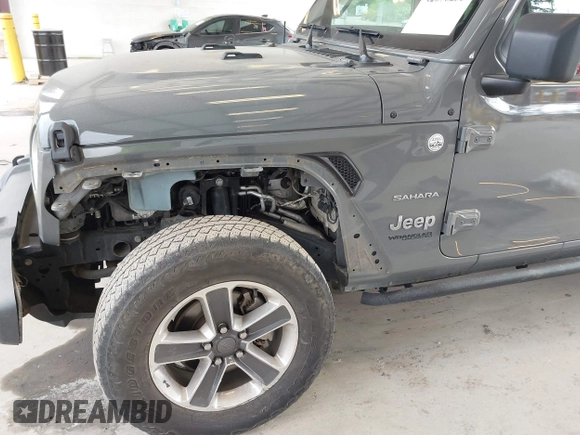 2019 Jeep Wrangler Unlimited Sahara with VIN 1C4HJXEN0KW540591, listed as a IAAI auction lot 42076235 with 41,016 mi miles and . Bid and sale history available at DreamBid. Image 6.