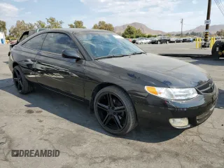 2000 Toyota Solara SE with VIN 2T1CF28P0YC337293, listed as a Copart auction lot 70659044 with 214,172 mi miles and Salvage Title. Bid and sale history available at carsss.com. Image 4.