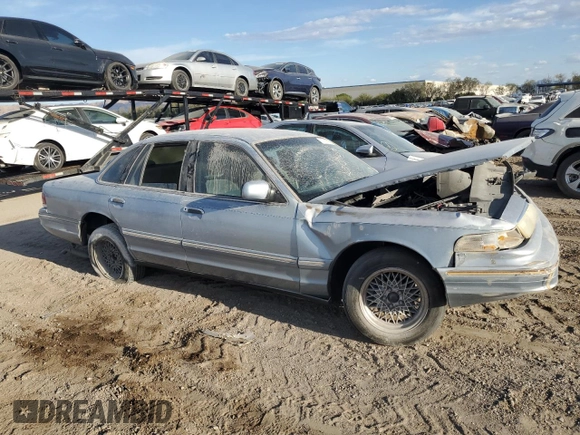 1997 Ford Crown Victoria LX z VIN 2FALP74W1VX206832, wystawiony jako Copart lot #51716425 z przebiegiem 325 063 mil mil oraz Szkoda całkowita • Salvage title. Historia ofert i sprzedaży dostępna na DreamBid. Obrazek 4.