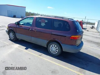 1999 Toyota Sienna LE with VIN 4T3ZF13C1XU112717, listed as a IAAI auction lot 41725827 with 272,639 mi miles. Bid and sale history available at carsss.com. Image 3.