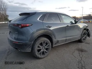 2023 Mazda CX-30 S Carbon Edition с VIN 3MVDMBCM3PM500403, выставлен на аукционе Copart как лот 88146095 с пробегом 29 861 миль миль и Списание • Salvage title. История ставок и продаж доступна на DreamBid. Изображение 3.