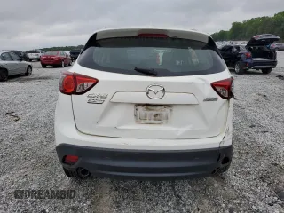 2016 Mazda CX-5 Sport with VIN JM3KE2BY0G0843786, listed as a Copart auction lot 54451275 with 111,363 mi miles and Salvage title. Bid and sale history available at DreamBid. Image 6.