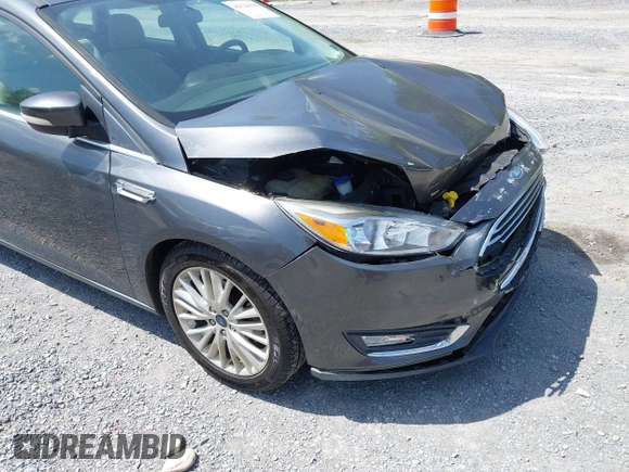 2018 Ford Focus Titanium с VIN 1FADP3J22JL314642, выставлен на аукционе IAAI как лот 42128194 с пробегом 62 787 миль миль и . История ставок и продаж доступна на DreamBid. Изображение 18.