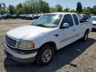 2002 Ford F-150 XL z VIN 1FTRX17L42NB56461, wystawiony jako Copart lot #59988885 z przebiegiem 244 057 mil mil oraz Czysty tytuł • Clean title. Historia ofert i sprzedaży dostępna na DreamBid. Obrazek 1.