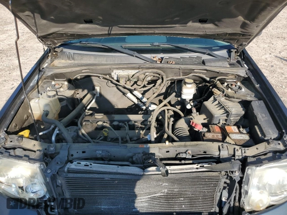 2009 Ford Escape XLS with VIN 1FMCU02739KD07929, listed as a Copart auction lot 64861745 with 144,914 mi miles and Clean title. Bid and sale history available at DreamBid. Image 11.