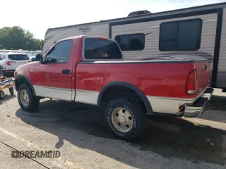 1998 Ford F-150 with VIN 1FTZF1821WKA63445, listed as a Copart auction lot 62563374 with 270,311 mi miles and Salvage title. Bid and sale history available at DreamBid. Image 2.