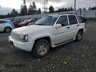1997 Jeep Grand Cherokee Limited with VIN 1J4GZ78Y7VC772292, listed as a Copart auction lot 87692445 with 0 mi miles and Salvage Title. Bid and sale history available at carsss.com. Image 1.