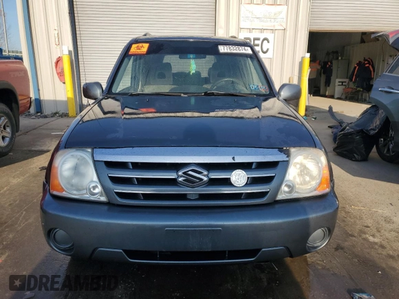 2004 Suzuki XL7 LX z VIN JS3TX92V544113643, wystawiony jako Copart lot #77832874 z przebiegiem Nie podano mil oraz Szkoda całkowita • Salvage title. Historia ofert i sprzedaży dostępna na DreamBid. Obrazek 5.
