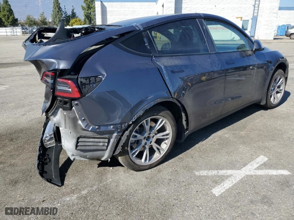 2023 Tesla Model Y Long Range with VIN 7SAYGDEE9PF916202, listed as a Copart auction lot 46614805 with 14,743 mi miles and Salvage Title. Bid and sale history available at carsss.com. Image 3.