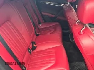 2014 Maserati Ghibli S Q4 z VIN ZAM57RTA7E1089301, wystawiony jako Copart lot #54070585 z przebiegiem 59 787 mil mil oraz Szkoda całkowita • Salvage title. Historia ofert i sprzedaży dostępna na DreamBid. Obrazek 6.