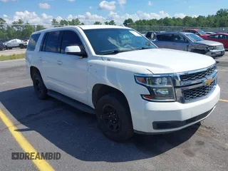 2018 Chevrolet Tahoe Commercial z VIN 1GNLCDEC1JR155210, wystawiony jako IAAI lot #42845068 z przebiegiem 159 456 mil mil oraz . Historia ofert i sprzedaży dostępna na DreamBid. Obrazek 1.