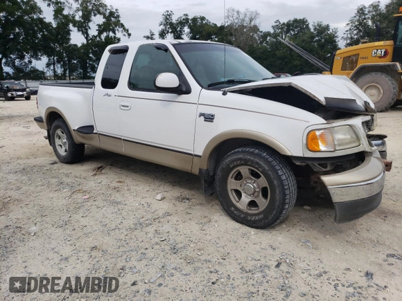 1999 Ford F-150 z VIN 1FTRX07W6XKA48100, wystawiony jako Copart lot #73209844 z przebiegiem Nie podano mil oraz Szkoda całkowita • Salvage title. Historia ofert i sprzedaży dostępna na DreamBid. Obrazek 4.
