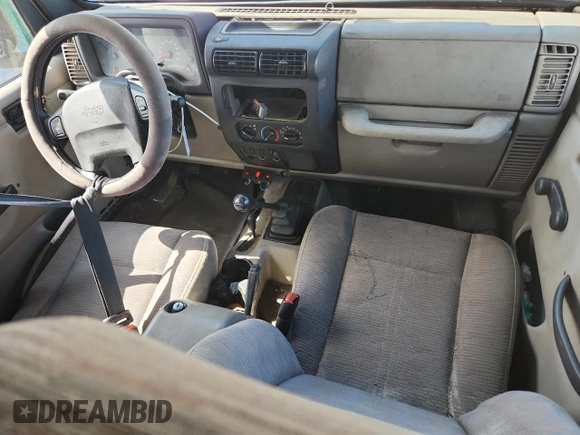 2003 Jeep Wrangler Rubicon with VIN 1J4FA69S13P310131, listed as a Copart auction lot 59139025 with 260,349 mi miles and Salvage title. Bid and sale history available at DreamBid. Image 8.