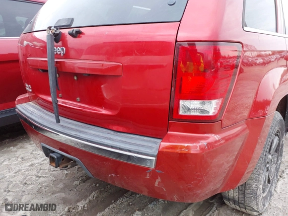 2009 Jeep Grand Cherokee Limited with VIN 1J8HR58P69C553747, listed as a IAAI auction lot 41860865 with 169,841 mi miles. Bid and sale history available at carsss.com. Image 16.