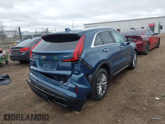 2024 Cadillac XT4 AWD Premium Luxury with VIN 1GYFZDR45RF143981, listed as a IAAI auction lot 42032787 with 14,700 mi miles and . Bid and sale history available at DreamBid. Image 4.