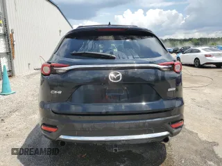 2018 Mazda CX-9 Grand Touring z VIN JM3TCADY2J0226902, wystawiony jako Copart lot #55352895 z przebiegiem 83 244 mil mil oraz Szkoda całkowita • Salvage title. Historia ofert i sprzedaży dostępna na DreamBid. Obrazek 6.