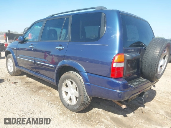 2003 Suzuki XL7 Touring z VIN JS3TX92V234104722, wystawiony jako IAAI lot #41994253 z przebiegiem 185 553 mil mil oraz . Historia ofert i sprzedaży dostępna na DreamBid. Obrazek 3.