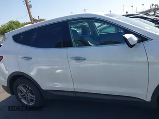 2017 Hyundai Santa Fe 2.4L z VIN 5XYZTDLB0HG403842, wystawiony jako IAAI lot #42206543 z przebiegiem 77 900 mil mil oraz . Historia ofert i sprzedaży dostępna na DreamBid. Obrazek 14.