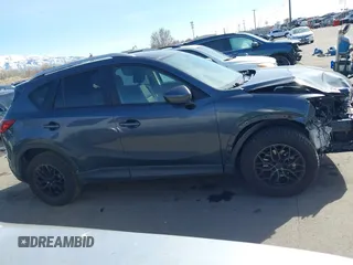 2013 Mazda CX-5 Touring with VIN JM3KE2CE6D0122405, listed as a IAAI auction lot 41743037 with 154,647 mi miles and . Bid and sale history available at carsss.com. Image 14.