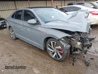 2021 Volkswagen Jetta GLI S z VIN 3VW6T7BUXMM060474, wystawiony jako IAAI lot #41454094 z przebiegiem 40 460 mil mil oraz . Historia ofert i sprzedaży dostępna na DreamBid. Obrazek 1.