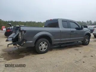 2015 Ford F-150 XL with VIN 1FTEX1C8XFFA48801, listed as a Copart auction lot 43728595 with 144,829 mi miles and Salvage Title. Bid and sale history available at carsss.com. Image 3.