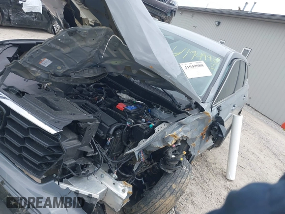 2024 Honda CR-V LX with VIN 2HKRS4H20RH403572, listed as a IAAI auction lot 41949988 with Not Provided miles and . Bid and sale history available at DreamBid. Image 2.